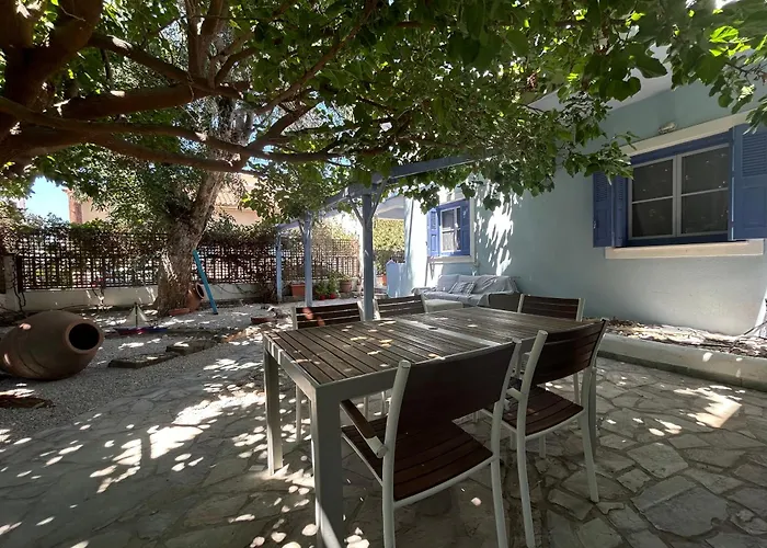 Blue Seaside House With Garden